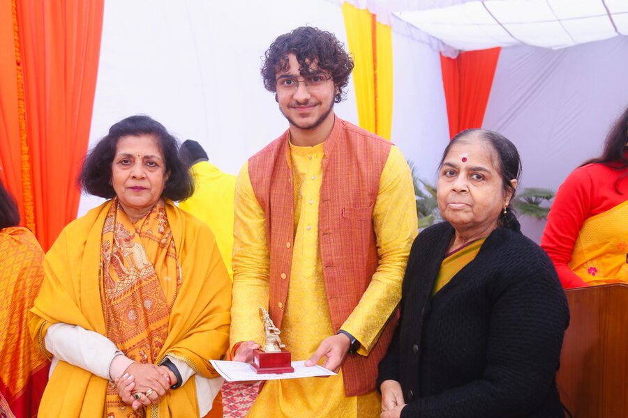 Ayush receiving a prize for a music competition